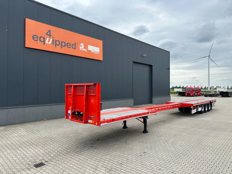 new and unused Heavy-Duty flatbed / 690cm extendable / steering axle / lift axle / twistlocks / timberstakes / NL-trailer / APK: 04-2027