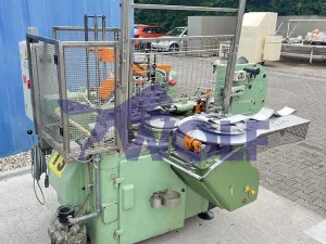 Stannioliermaschine RASCH - Type RU-DC mit Banderolenstation und Vakuumpumpe.