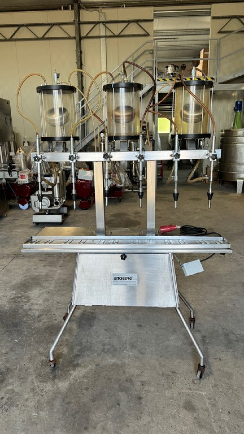 IN-LINE FILLING MACHINE WITH 6 NOZZLES IN STAINLESS STEEL WITH VACUUM, ENOBERG BRAND, SECOND-HAND MACHINE