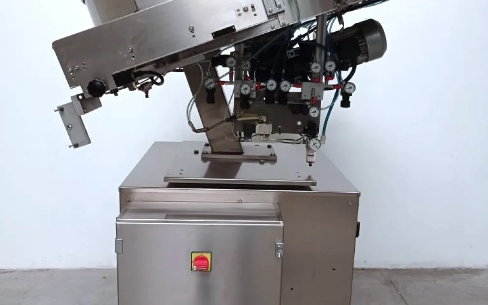 ORIENTATORE ALIMENTATORE PER TAPPI – SARG Mod. STM120