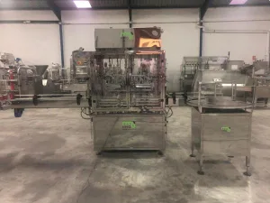 Linea de envasado lineal en acero inoxidable AISI 316L para todo tipo de liquidos construida a medida