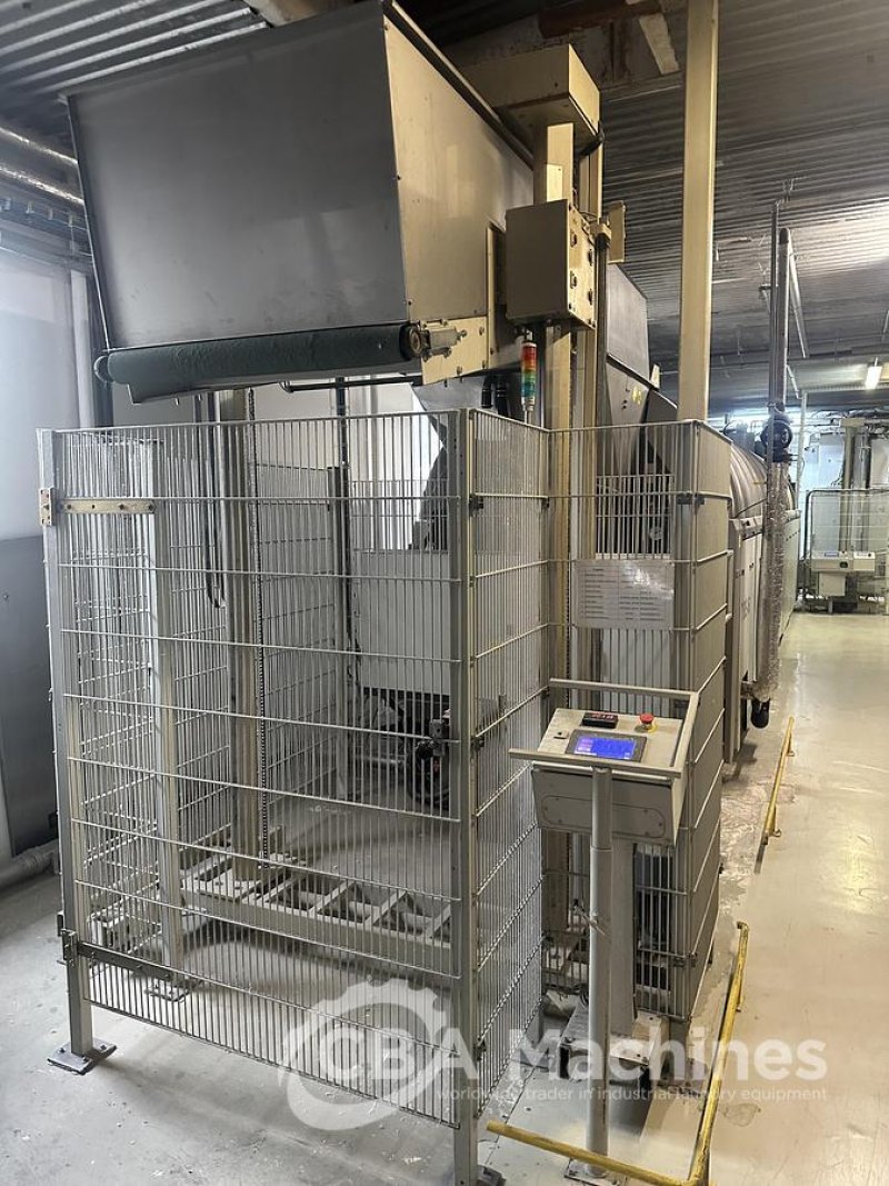 2009 Girbau stationary lift to load 12x50kg tunnel