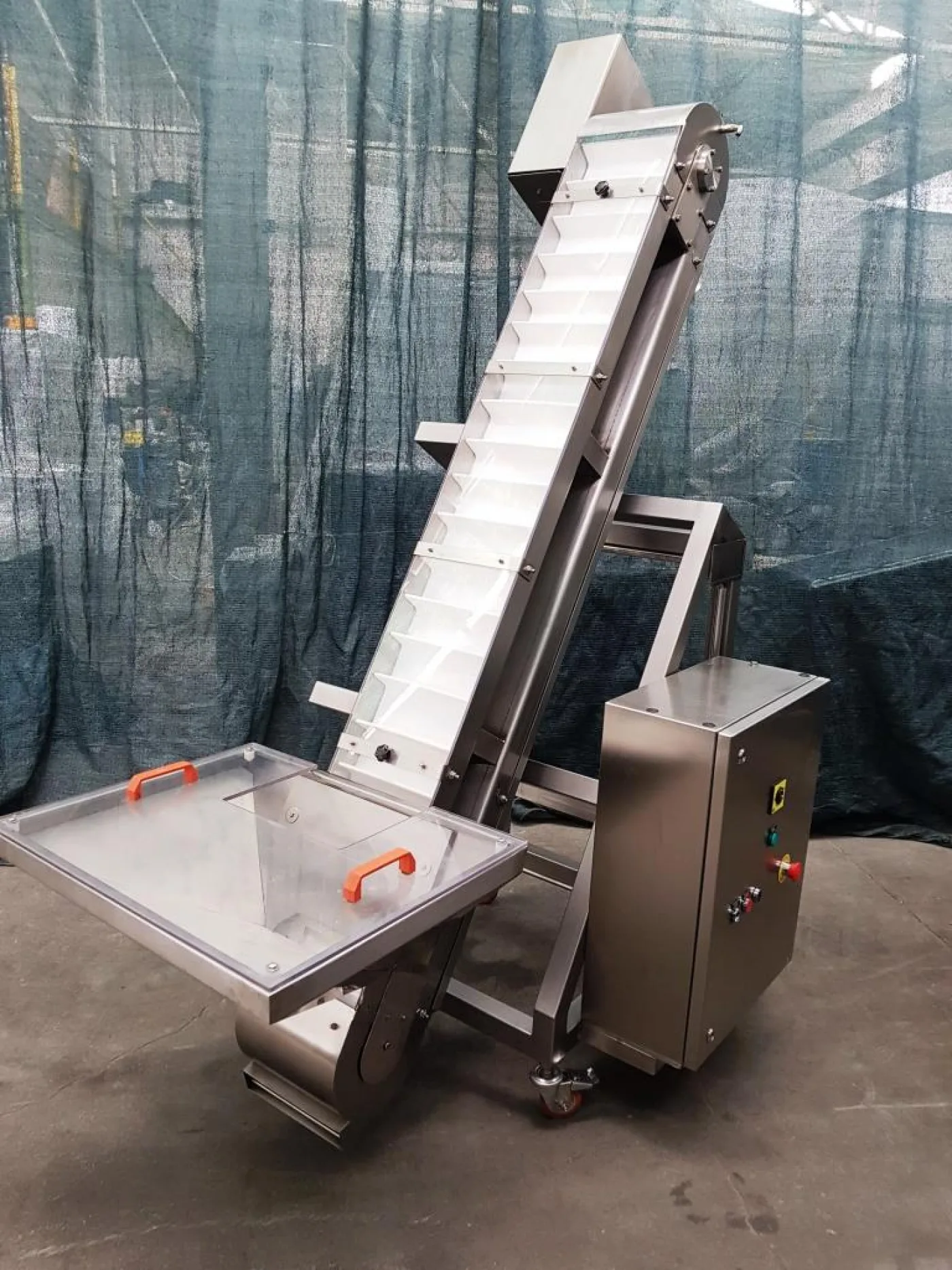 ELEVATORE A TRAMOGGIA PER COMPRESSE - 1