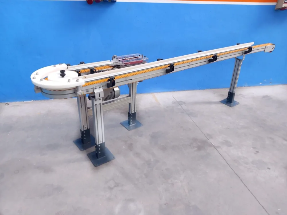 NASTRO TRASPORTATORE MOTORIZZATO CON CURVA A 180° – BETT SISTEMI