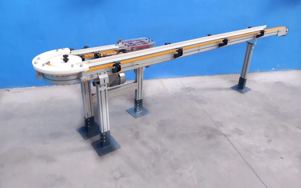 NASTRO TRASPORTATORE MOTORIZZATO CON CURVA A 180° – BETT SISTEMI