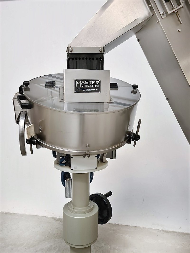 ELEVATORE E ALIMENTATORE PER TAPPI – MASTER VIBRATORI
