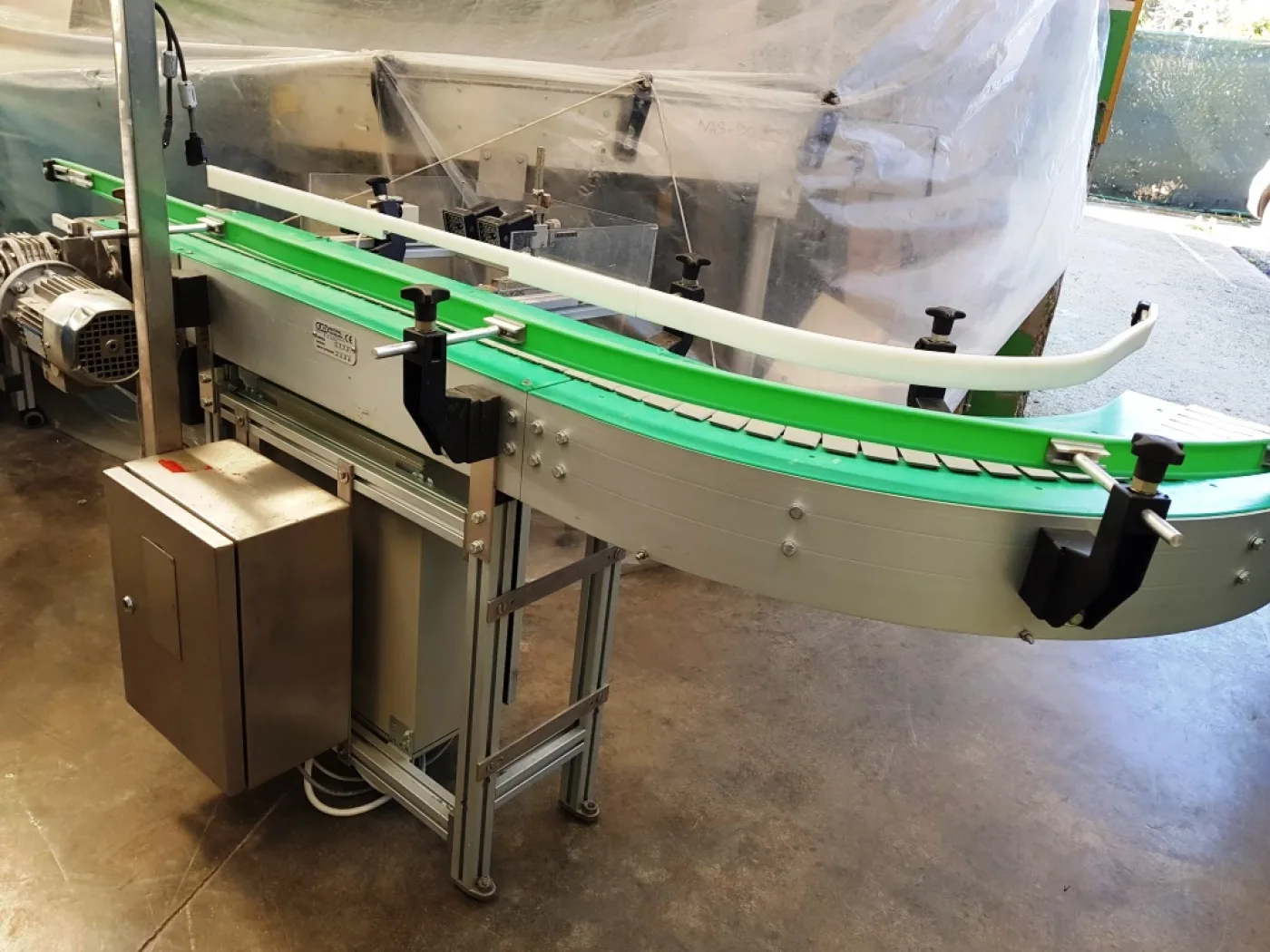NASTRO TRASPORTATORE MOTORIZZATO A TAPPARELLE CON CURVA A 90° – MATERIAL HANDLING - 2