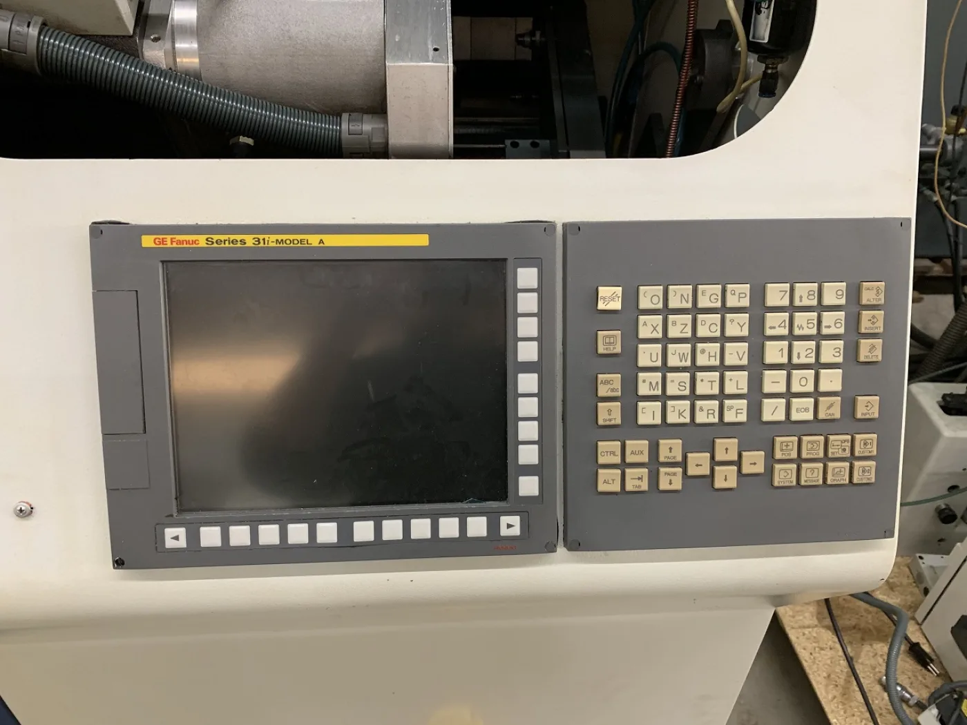 TOUR AUTOMATIQUE CNC “TORNOS” DECO SIGMA 20 - 5