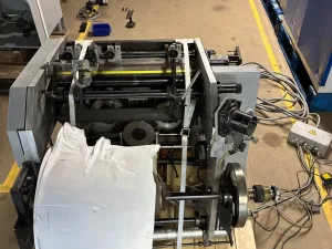 Muller Martini Gauzing/Mull/Lining station