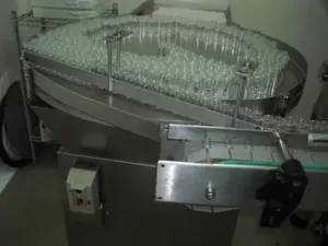 USED HISPAMEC VIALS AND BOTTLES PACKAGING LINE