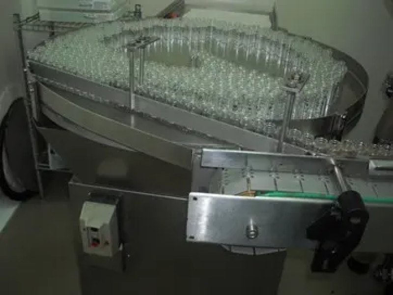 USED HISPAMEC VIALS AND BOTTLES PACKAGING LINE