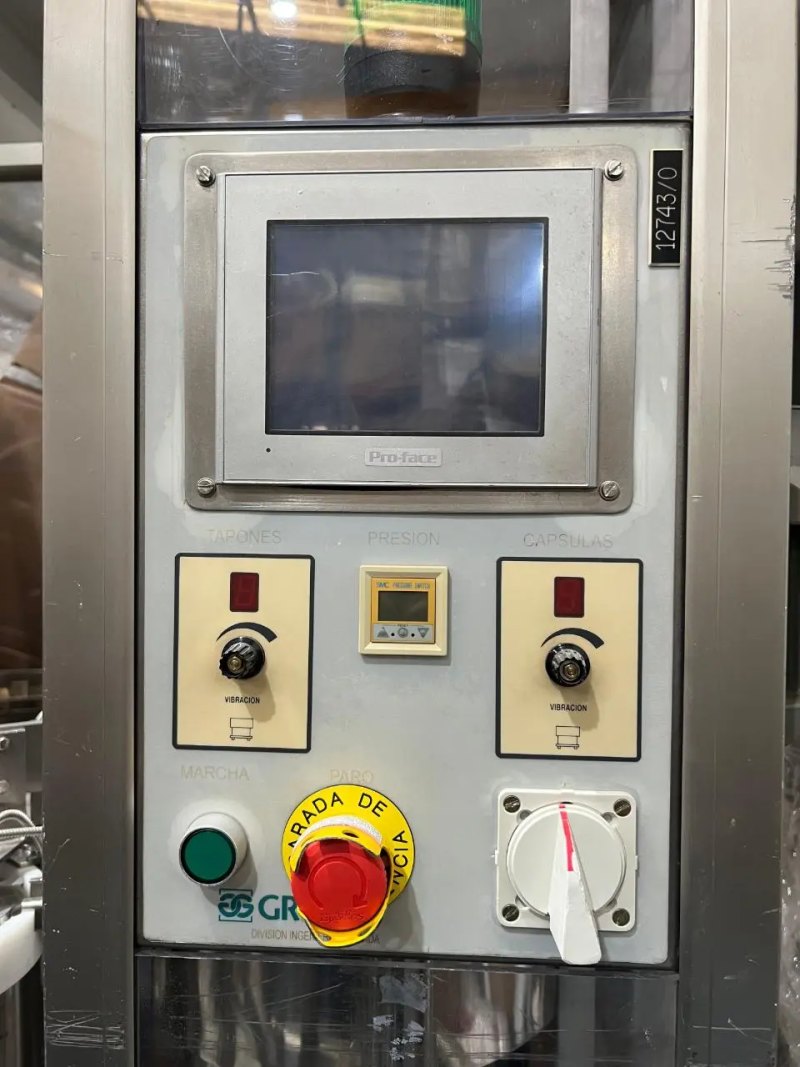 USED STAINLESS STEEL CAP ASSEMBLER
