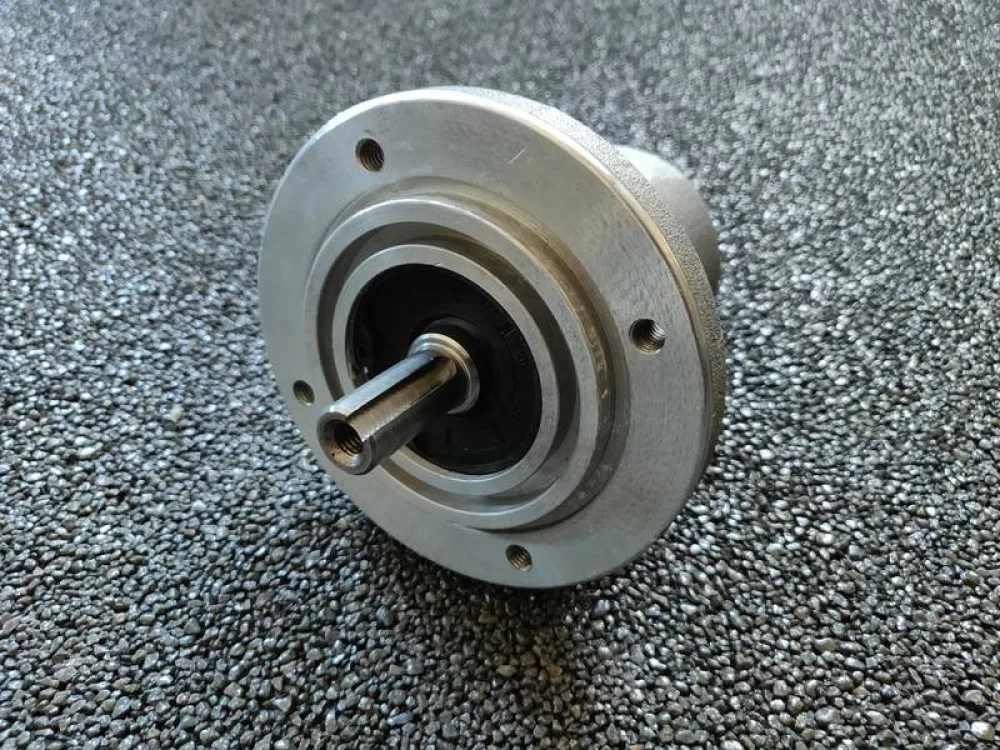 Bearing housing for plucker