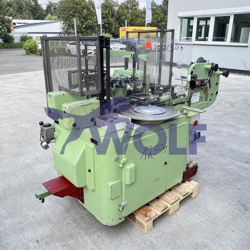 Stannioliermaschine RASCH - Type RU-D für Doppeldreheinschlag eingerichtet.