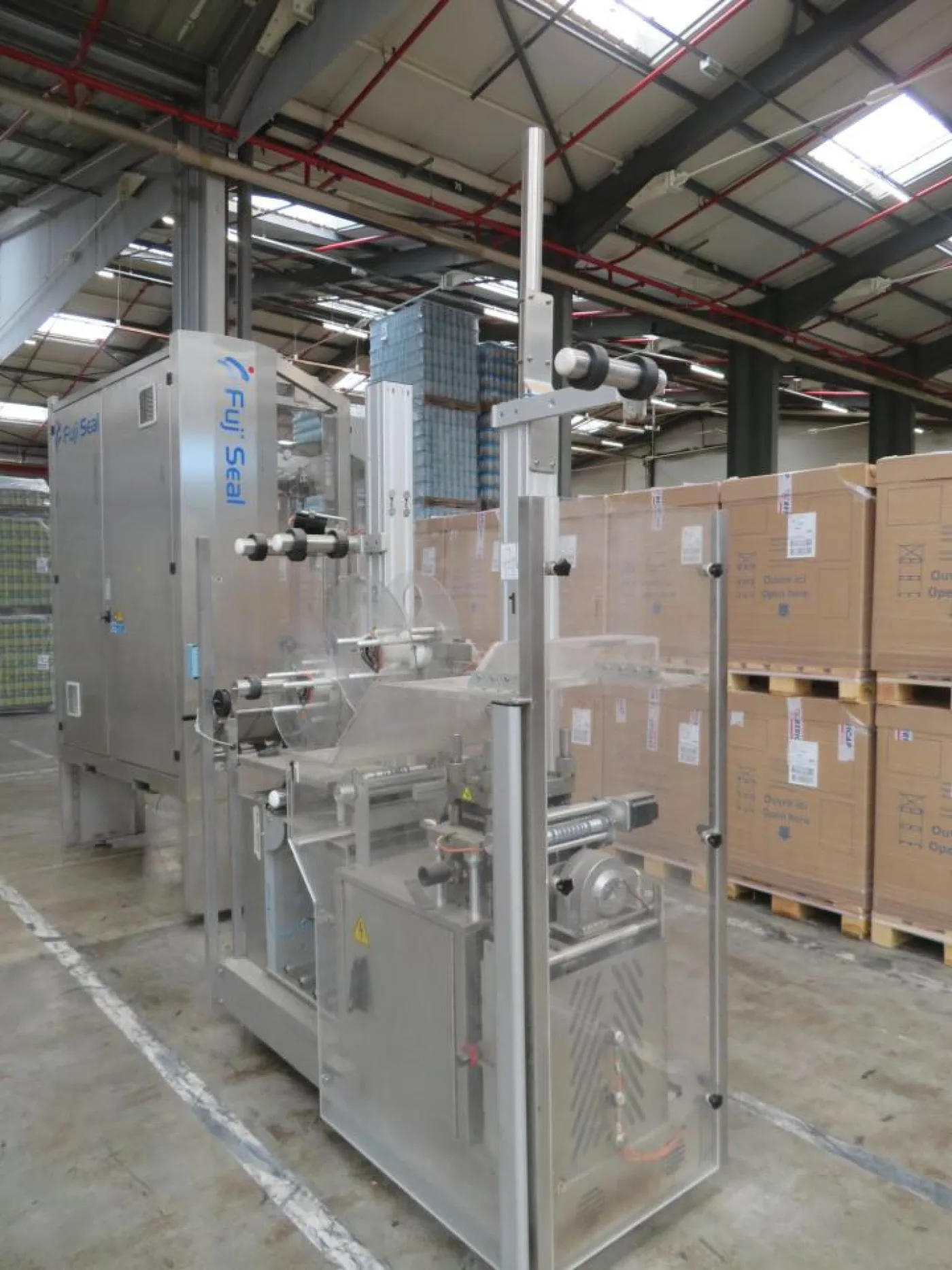Fuji Seal Europe BV Fuji Seal Heat Shrink Tunnel Sleeve Film Feeder Unit - Flasche Sleever Line - 4