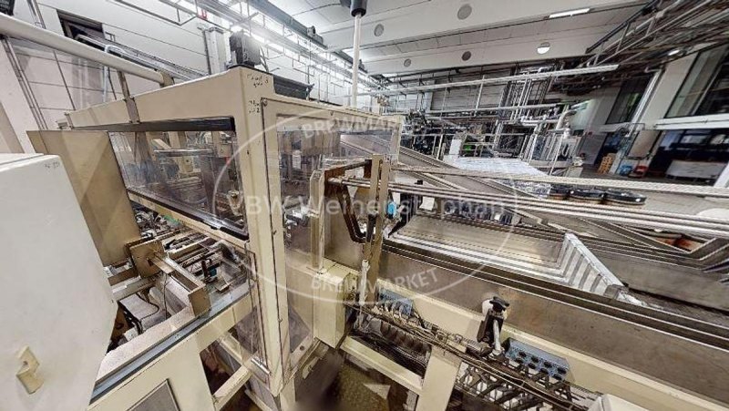 Tray packaging and shrink wrapping machine