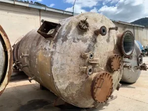 STAINLESS STEEL TANK 16,000 LITERS WITH COIL AND USED SLEEVE