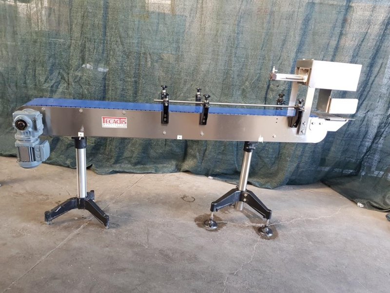 NASTRO TRASPORTATORE MOTORIZZATO CON SPINGITORE – TECADIS