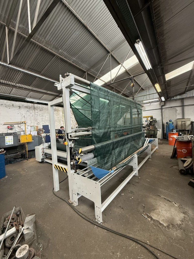 Fabric doubling/folding machine