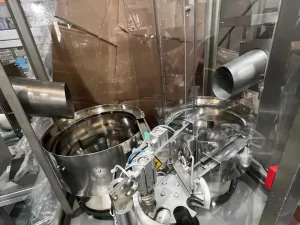 USED STAINLESS STEEL CAP ASSEMBLER