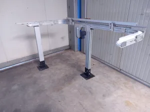 NASTRO TRASPORTATORE MOTORIZZATO, DUE CURVE A 90° – FLEXLINK