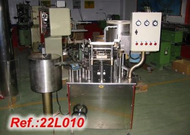LLENADORA - CERRADORA AUTOMÁTICA DE VIALES PARA LÍQUIDOS