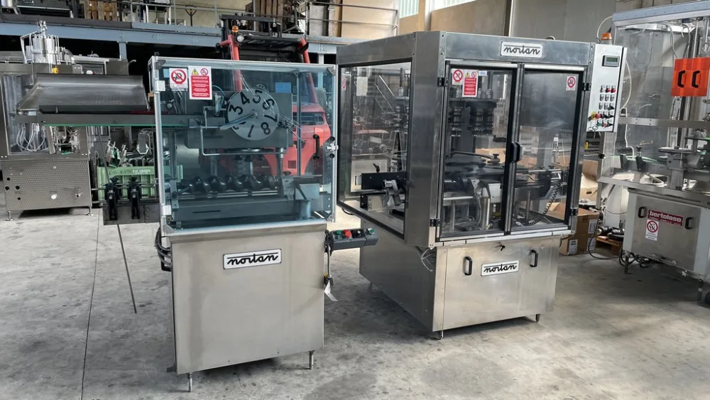 CAPSULE DISTRIBUTOR NORTAN MODEL MULTICAP 120 AND ROLLING MACHINE NORTAN FOR CAPSULES, MODEL AURORA 120, SECOND-HAND MACHINES