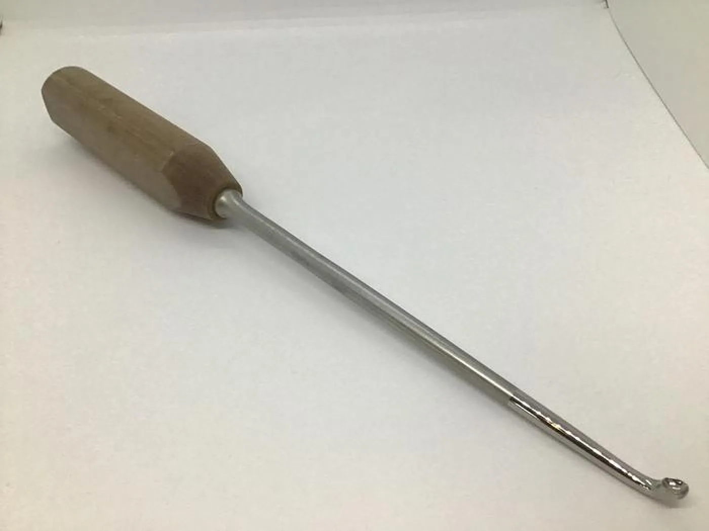 Surgical Holdings Curette Angled - 1