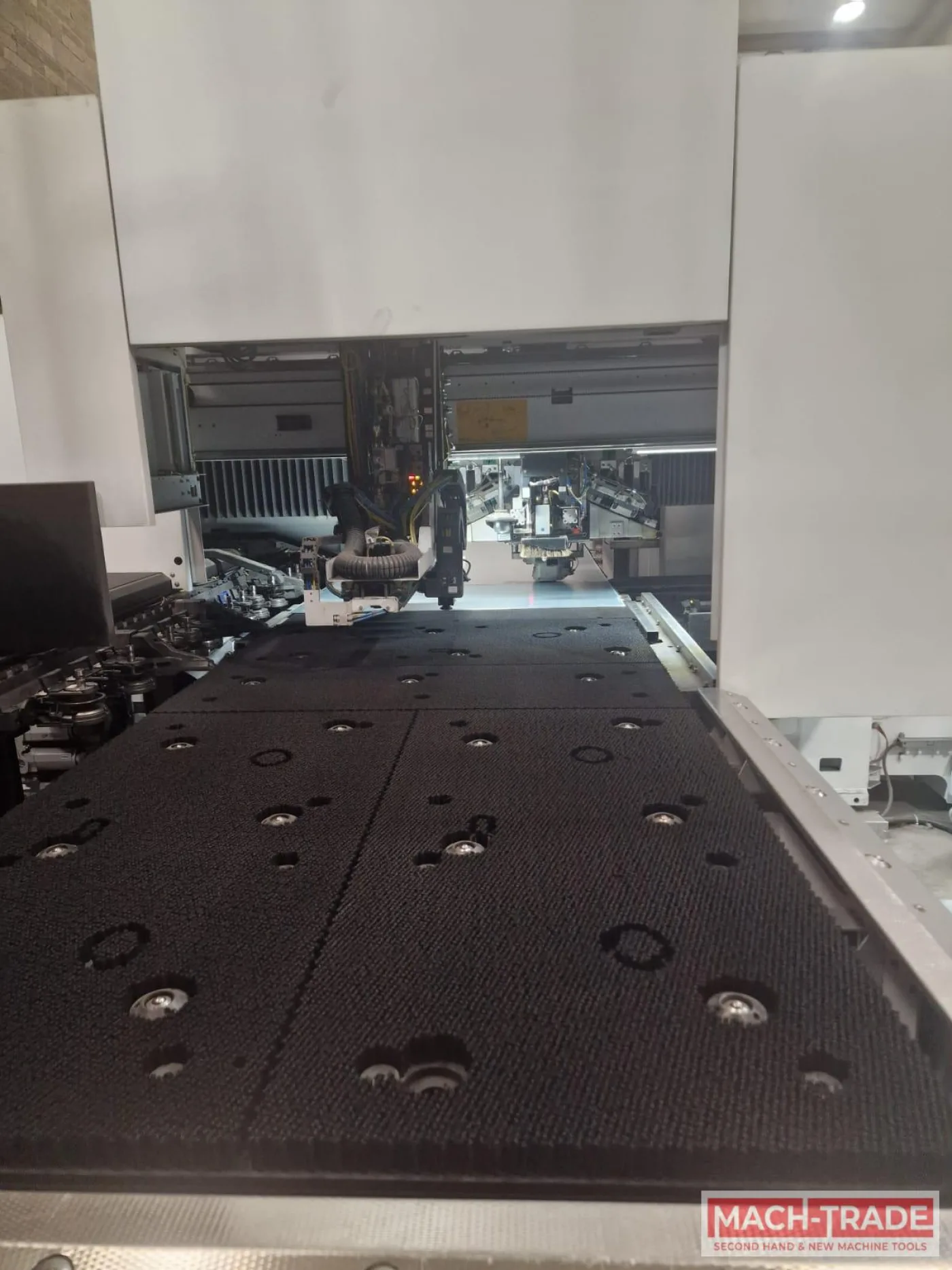 Punch laser combination machine Trumpf TRUMATIC 1000 fiber (K07) with SheetMaster Compact - 1