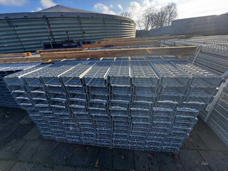 4 tonnes of stacked galvanized steel floor panels