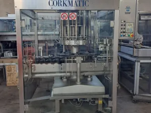 MBF 12-HEAD CORKING MACHINE FOR MUSHROOM AND NATURAL CORKS, MODEL CORKMATIC R/S, WITH NERI CAP FEEDER, USED MACHINE