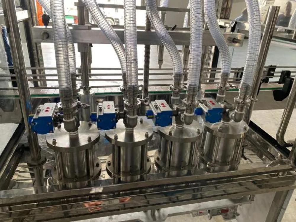 Llenadora NUEVA MMG de 4 pistones con capacidad hasta 1 litro acero inoxidable 316 L