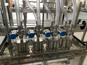 Llenadora NUEVA MMG de 4 pistones con capacidad hasta 1 litro acero inoxidable 316 L