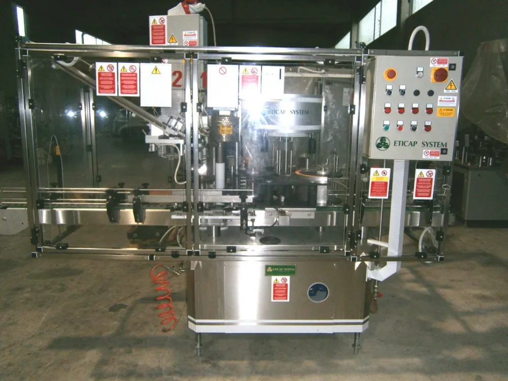 LABELLING MACHINE ETICAP SYSTEM 3 LOACKING HEADS 2 STATIONS FOR APPLY LABEL AND BACK LABEL SECOND-HAND MACHINE
