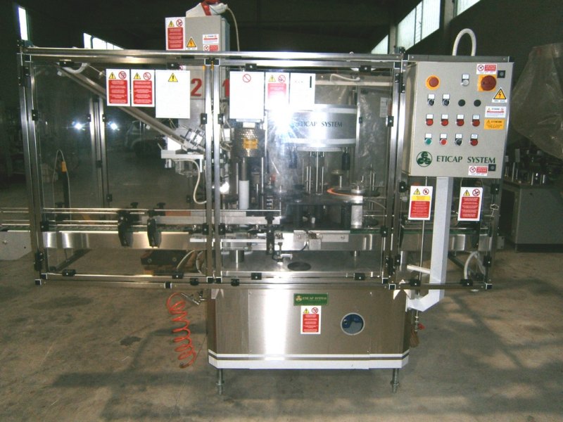 LABELLING MACHINE ETICAP SYSTEM 3 LOACKING HEADS 2 STATIONS FOR APPLY LABEL AND BACK LABEL SECOND-HAND MACHINE