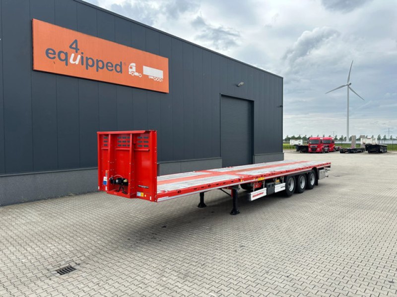 new and unused Heavy-Duty flatbed / 690cm extendable / steering axle / lift axle / twistlocks / timberstakes / NL-trailer / APK: 04-2027