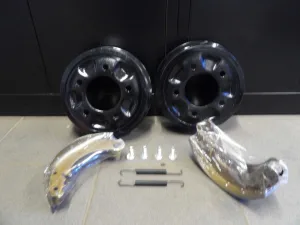 Remschoen as-set voor of achter-as