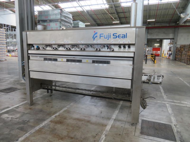 Fuji Seal Europe BV Fuji Seal Heat Shrink Tunnel - Flasche Sleever Line