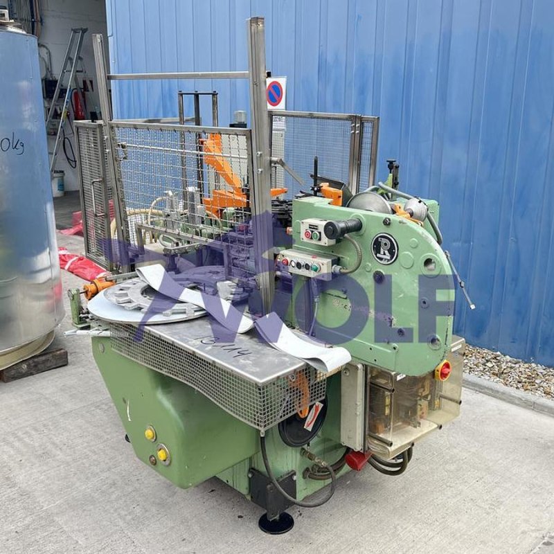 Stannioliermaschine RASCH - Type RU-DC mit Banderolenstation und Vakuumpumpe.