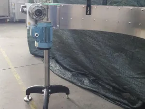 NASTRO TRASPORTATORE CURVO A 90° IN ACCIAIO INOX MOTORIZZATO