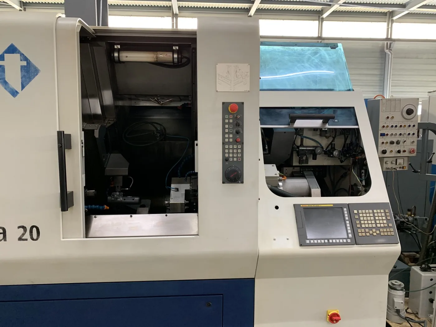 TOUR AUTOMATIQUE CNC “TORNOS” DECO SIGMA 20 - 4