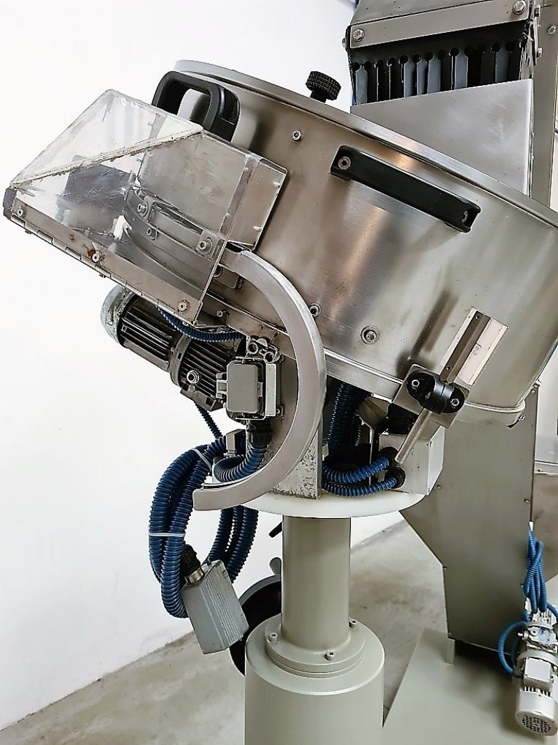 ELEVATORE E ALIMENTATORE PER TAPPI – MASTER VIBRATORI