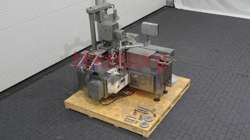 Filling and wrapping machine for miniportions of butter Benhil 8304 - 8534