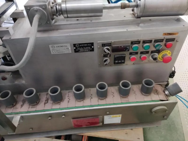 USED ANCIMO DPM-10 TUBE FILLER AND CLOSER