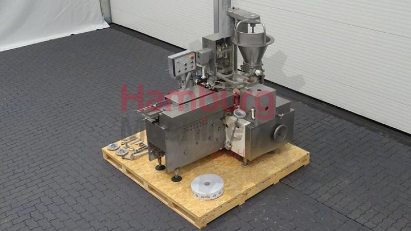 Filling and wrapping machine for miniportions of butter Benhil 8304 - 8534