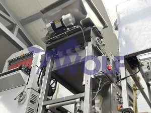 Edelstahl-Vibrationsstreuer - mit Gitterbandtisch ca. 420 mm Arbeitsbreite.