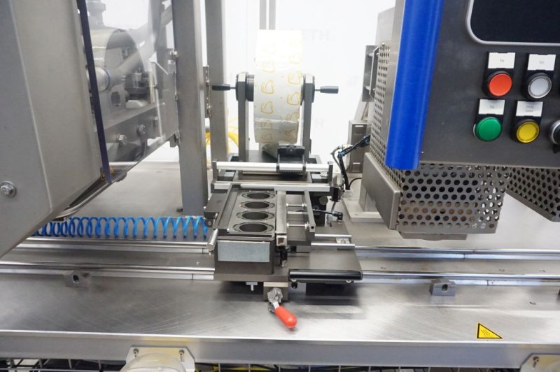 Oystar Hassia Cup filler - Piston filler