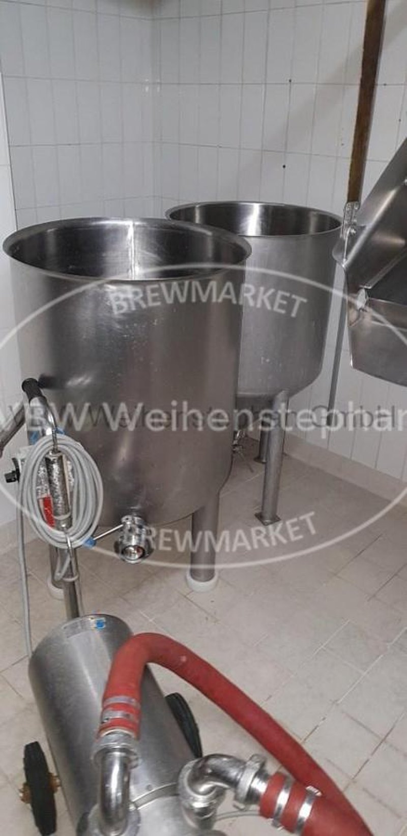 Open conical stainless steel vessel