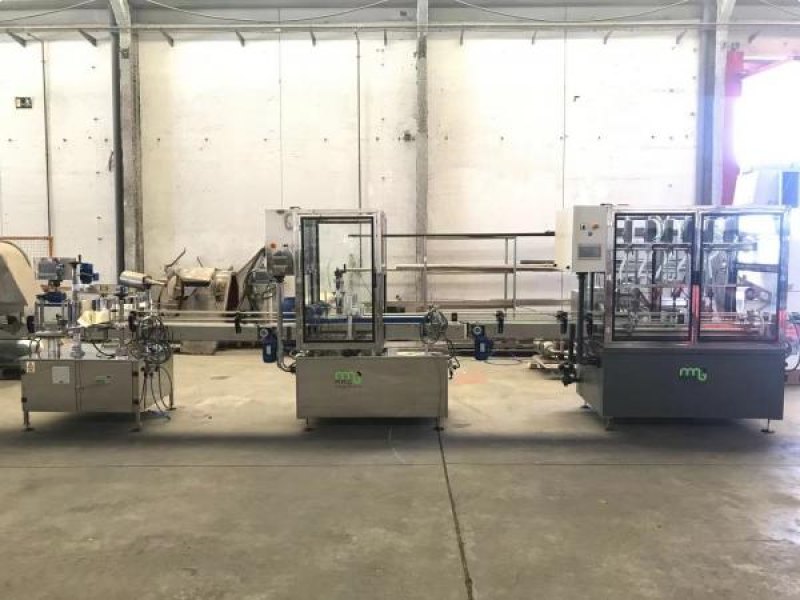 Línea de envasado de botellas y garrafas nueva fabricación construida en acero inoxidable 316 y PVC para productos químicos corrosivos