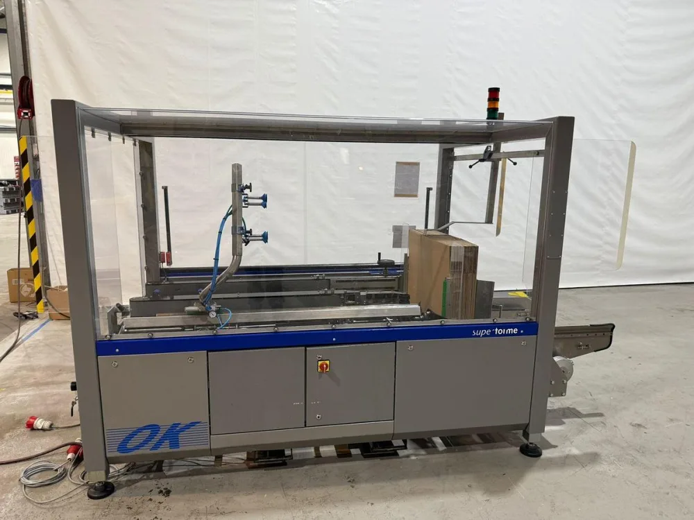 2010 OK Packaging Systems B.V. Superformer-1 dozenmachine met tape